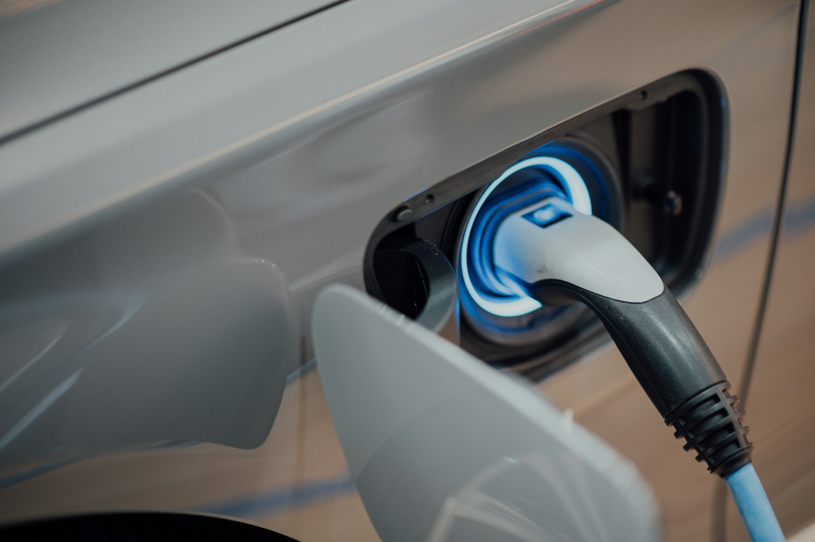 A Level 2 charging plug connected to an electric vehicle at a Guelph home