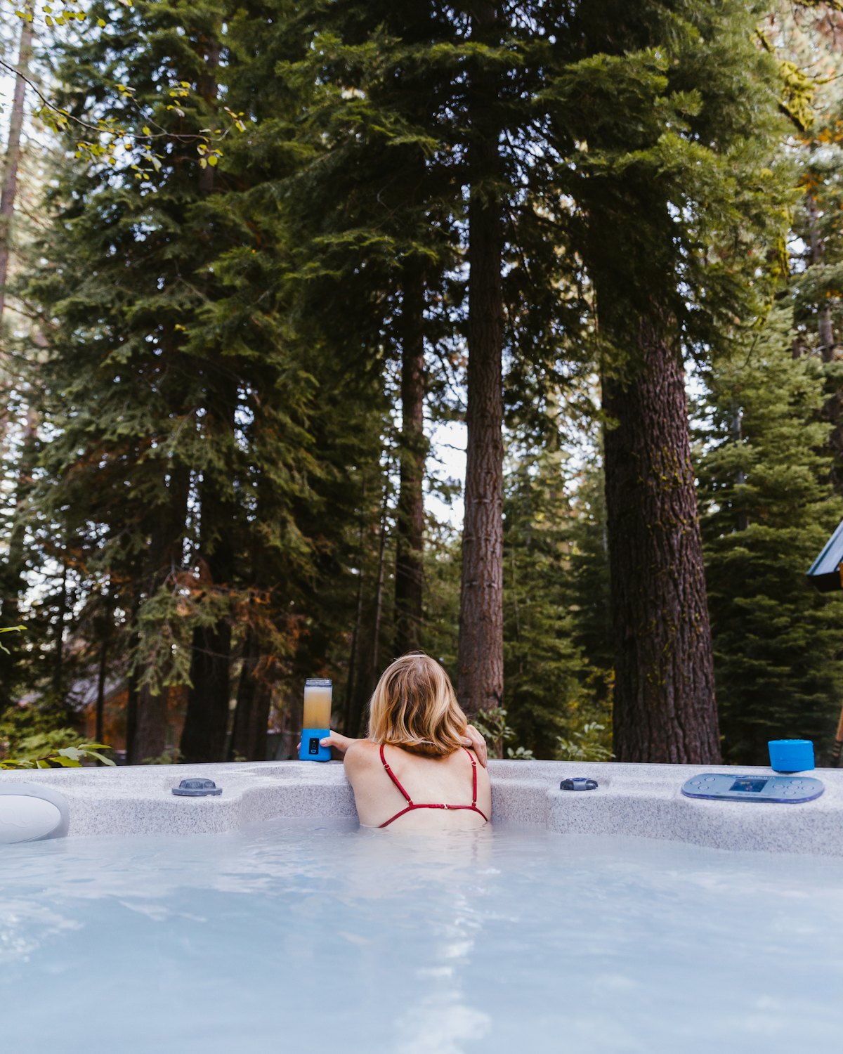 A backyard hot tub among the trees outside Rockwood, wired on its own GFCI protected circuit