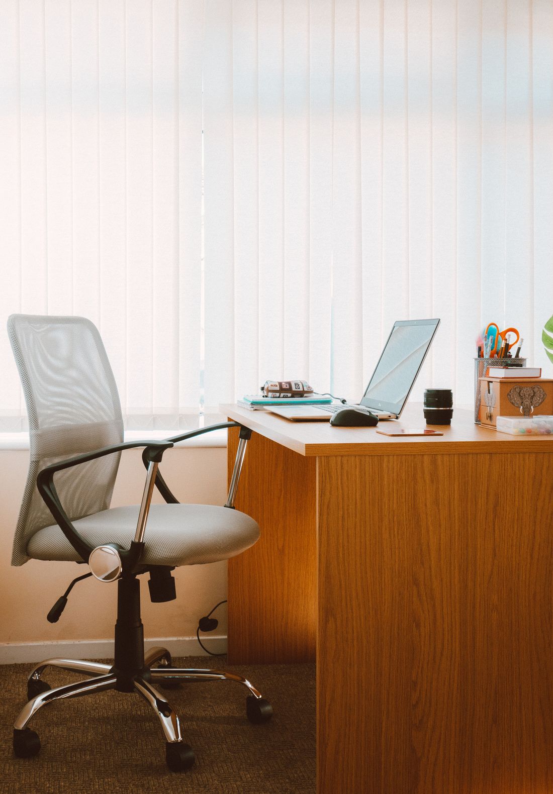 A tidy desk with an adjustable chair, the kind of setup we walk through in Kitchener assessments