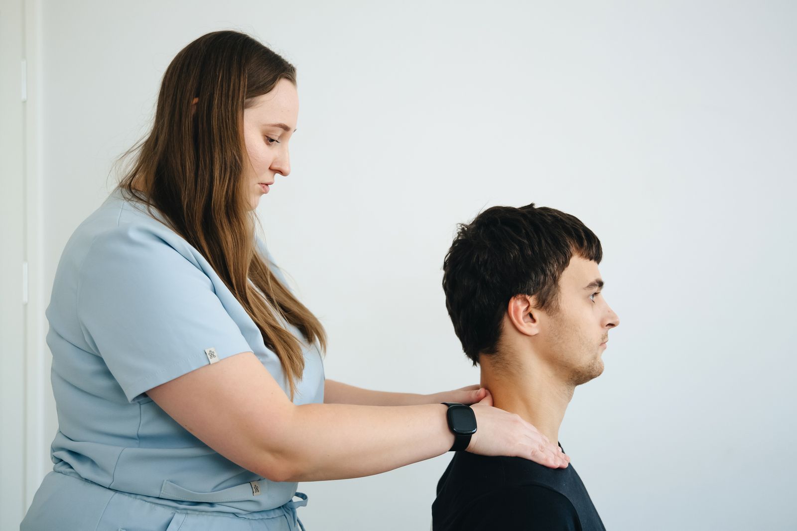Maya Prasad treating a patient at Stride Physiotherapy in Kitchener