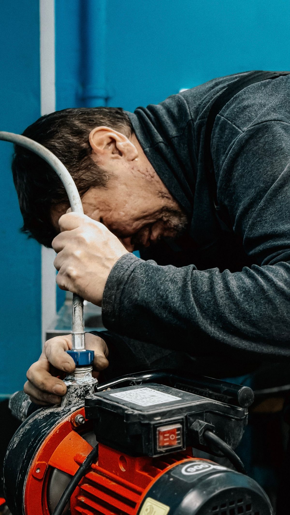 A technician works on a jet pump of the kind that feeds most Oro-Medonte wells